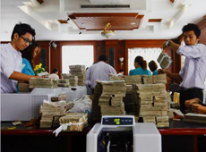 The Central Bank of Myanmar (CBM) starts unrestricted sales of foreign currency at its owned specified rate to help importers hit by exchange rate fluctuations 