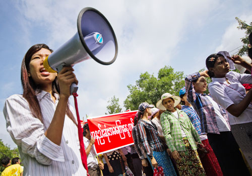 Factory workers demonstrate in favour of minimum wage rate of Kyat 4,000 which is Kyat 400 higher than the proposed rate of Kyat 3,600 